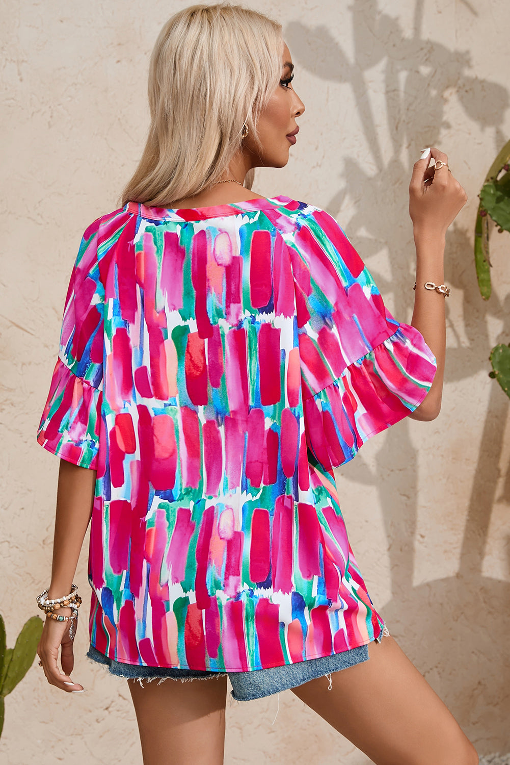 Arty Peplum Sleeve Blouse
